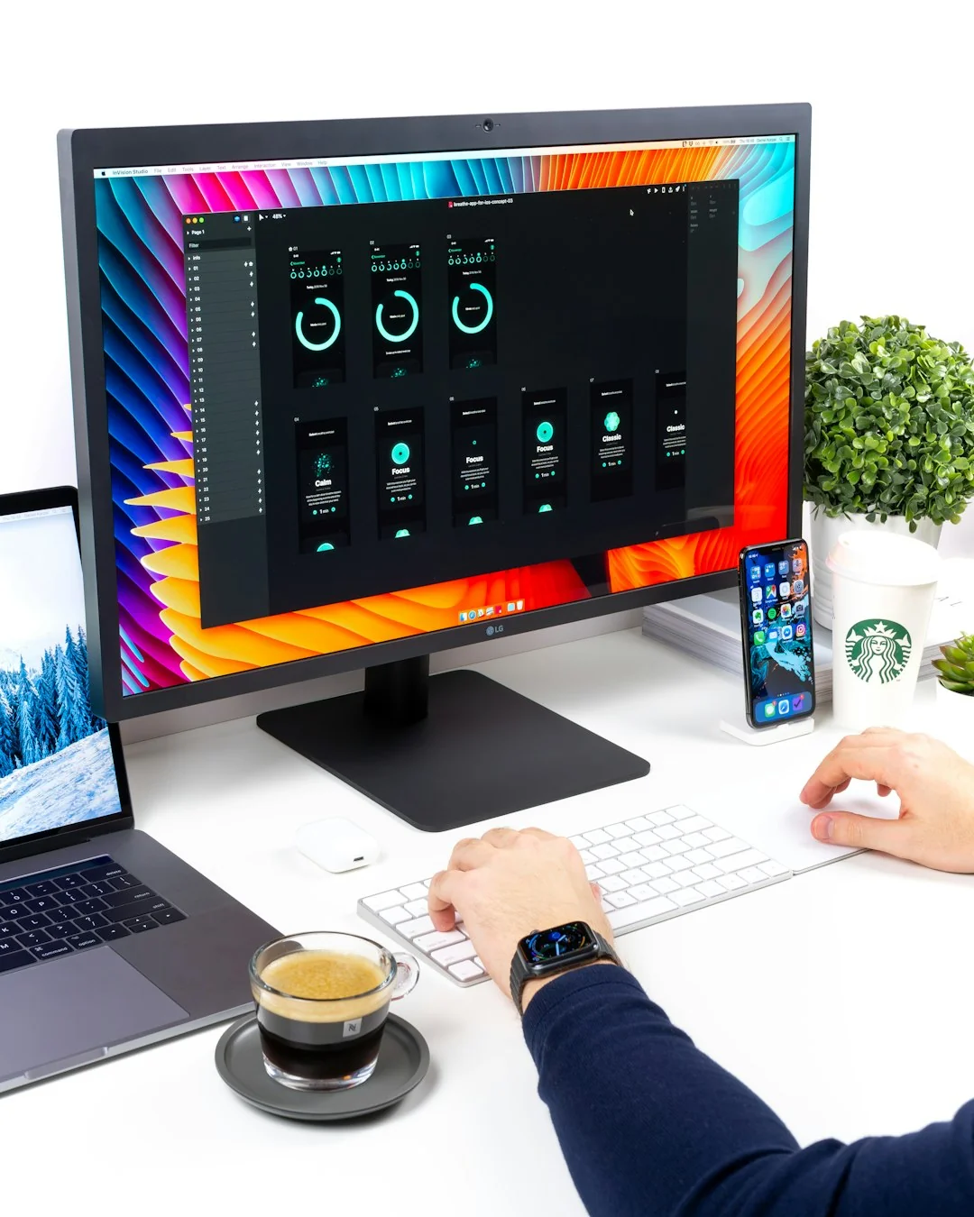 A modern workspace featuring a laptop, tablet, and smartphones, well suited for tech and freelance work.